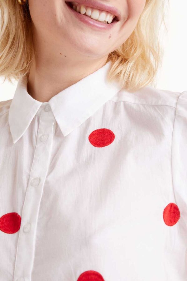 Red polka dot shirt